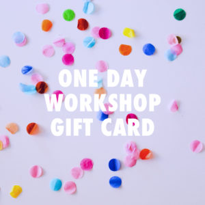 This is an image of confetti with the text one day workshop gift card.