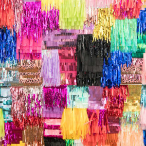 This is an image of a crazy colourful tinsel wall for lawyers who bedazzle!